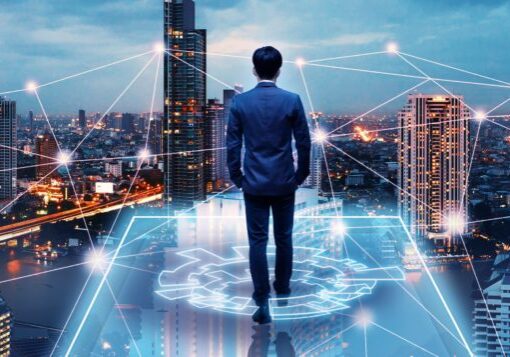 Business technology concept, Professional business man walking on future network city background and futuristic interface graphic at night, Cyberpunk color style